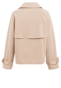 Light beige jacket with a back flap, raglan sleeves, and adjustable cuffs. Made from smooth material with a clean design.