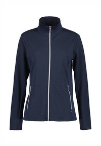 Veste zippée de marine avec col haut, tissu texturé, deux poches zippées à l'avant et détail de fermeture éclair contrastant. Manches longues et design ajusté.