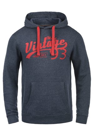 Hanorac bleumarin cu șireturi roșii și buzunar frontal. Are inscripționat în litere îngroșate de culoare roșie "Blend Vintage 93". Textură a materialului moale.