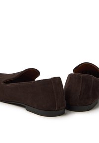 Brown suede slip-on shoes with a rounded toe, low black rubber heel, and cut-out sides for a breathable design. Stitched accents on edges.