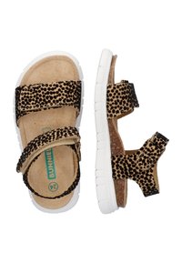 Leopardenmuster-Sandalen mit zwei verstellbaren Riemen, Korkfußbett und einer weißen Gummisohle, die eine strukturierte Oberfläche und ein offenes Design aufweisen.