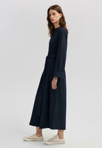 Touché Privé BELTED OVERALLS - Tuta jumpsuit - navy blue