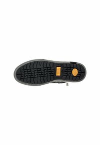 Zwarte rubberen zool met diepe profielpatronen, voorzien van een cirkelvormige oranje accent en een zijrits. Ontworpen voor grip en stabiliteit.