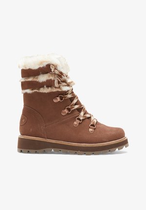 Brown suede ankle boot with a faux fur collar, decorative laces, and rugged rubber sole featuring zigzag tread for traction.