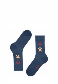 Bawełniane skarpetki w kolorze granatowym z wzorem ciasteczka piernikowego, z czerwonym napisem "TWARDY CIASTEK" oraz uśmiechniętym ciasteczkiem w okularach przeciwsłonecznych.