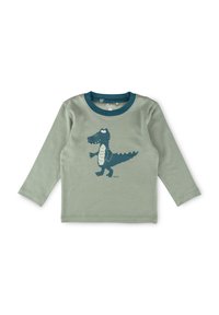 Green long-sleeve toddler shirt with dark green collar and cartoon crocodile illustration on the front.