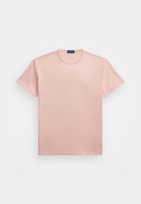 Helles rosa Baumwoll-T-Shirt mit rundem Halsausschnitt und kurzen Ärmeln. Verfügt über ein kleines gesticktes Logo auf der Brust und subtile Texturvariationen.