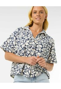 Kurzarmhemd in Marineblau mit weißem Blumenmuster, Knopfleiste, Kragen, lockere Passform und strukturiertem Stoff.