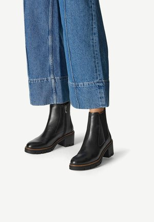 Marco Tozzi Bottines à plateau - black comb