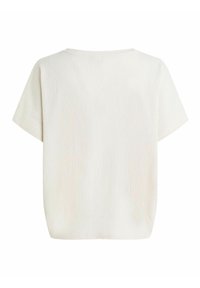 Haut blanc à manches courtes avec une coupe décontractée, présentant un tissu texturé et un col rond, adapté pour un usage décontracté.