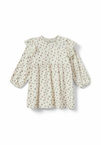 Cvjetna haljina u krem boji s nabrani korzetom, nabranim ramenima, dugim rukavima i malim crvenim uzorcima. Izrađena od mekanog materijala s opuštenim krojem.