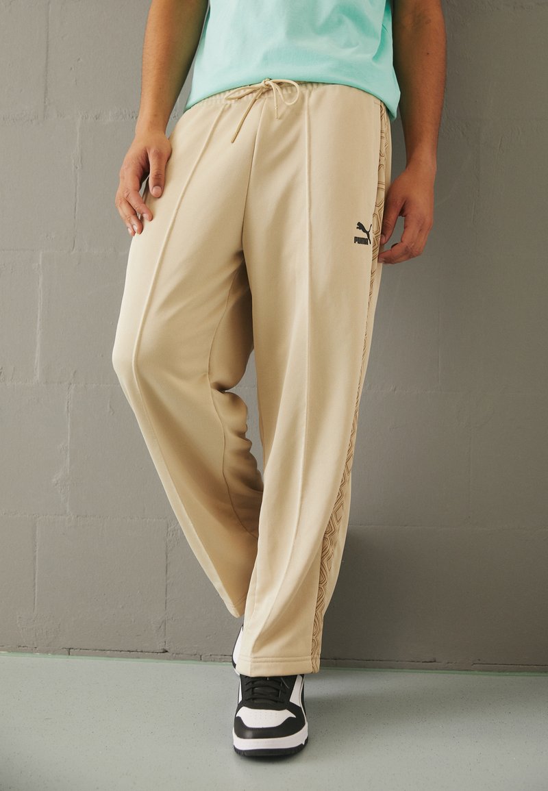 Puma TREND 7ETTER TRACK PANTS Jogginghose granola/beige Zalando.ch