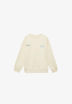 Felpa color crema con colletto rotondo, maniche lunghe a raglan, polsini a coste e dettagli del logo stampato sul petto. Tessuto morbido.