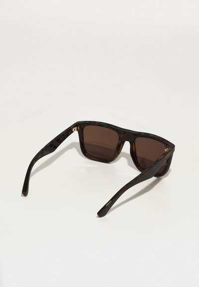 Brown-tinted sunglasses with a tortoiseshell frame, featuring straight arms and subtle texturing on the temples. Gold hardware accents present.