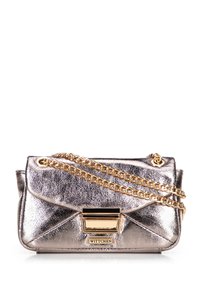 Metallic silver handbag with a quilted pattern, gold chain strap, and a golden clasp featuring the brand logo. Compact, elegant design.