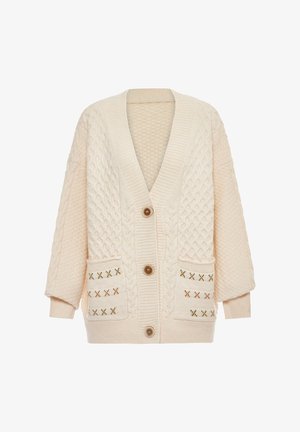 Cream chunky knit cardigan with cable patterns, three buttons, long sleeves, ribbed cuffs, and two front pockets featuring stitched X designs.