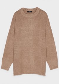 Beige knitted sweater with a round neckline, dropped shoulders, and ribbed cuffs. Features a soft texture and loose, relaxed fit.