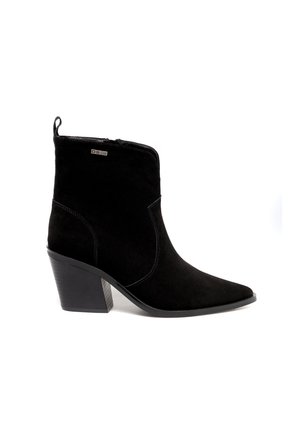 Must musta ankle saapad terava nina, külgsete tõmblukkudega ja keskmise plokkn צווישן. Omab õmblusteenuseid ja tõmbeantu taga.