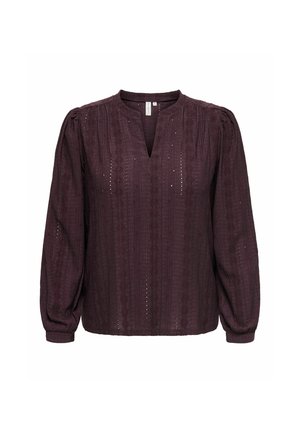 Blouse manches longues violet foncé avec motifs verticaux texturés, épaules légèrement bouffantes et petit col en V sans boutons.