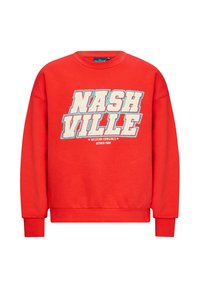 Felpa rossa con colletto tondo e maniche lunghe, caratterizzata dal testo "NASHVILLE" in grandi lettere bianche e un testo più piccolo sottostante.