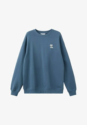 Blue crewneck sweatshirt with long sleeves and small white palm tree and wave graphic on the left chest.