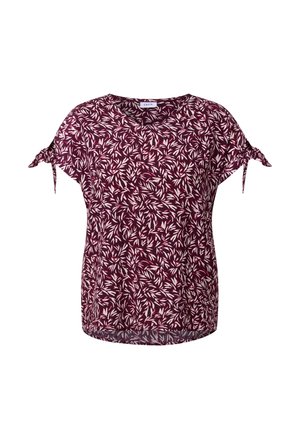 Burgundská halenka s květinovým vzorem v bílé a růžové barvě. Krátké rukávy s ozdobnými šňůrkami. Lehká látka s pohodlným volným střihem.