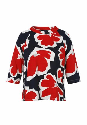 Haut à manches courtes pour femme avec un motif floral abstrait rouge et blanc sur fond noir et un col rond.