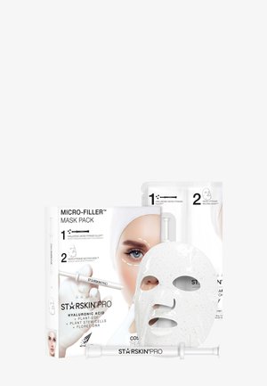 Coffret de masques StarSkin Pro Micro-Filler avec un masque en tissu blanc pour le visage, des applicateurs de soins de la peau et un emballage représentant le visage d’un mannequin.