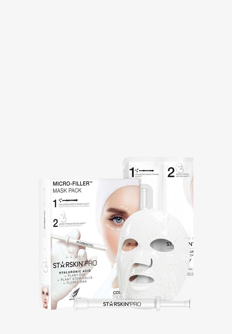 Coffret de masques StarSkin Pro Micro-Filler avec un masque en tissu blanc pour le visage, des applicateurs de soins de la peau et un emballage représentant le visage d’un mannequin.