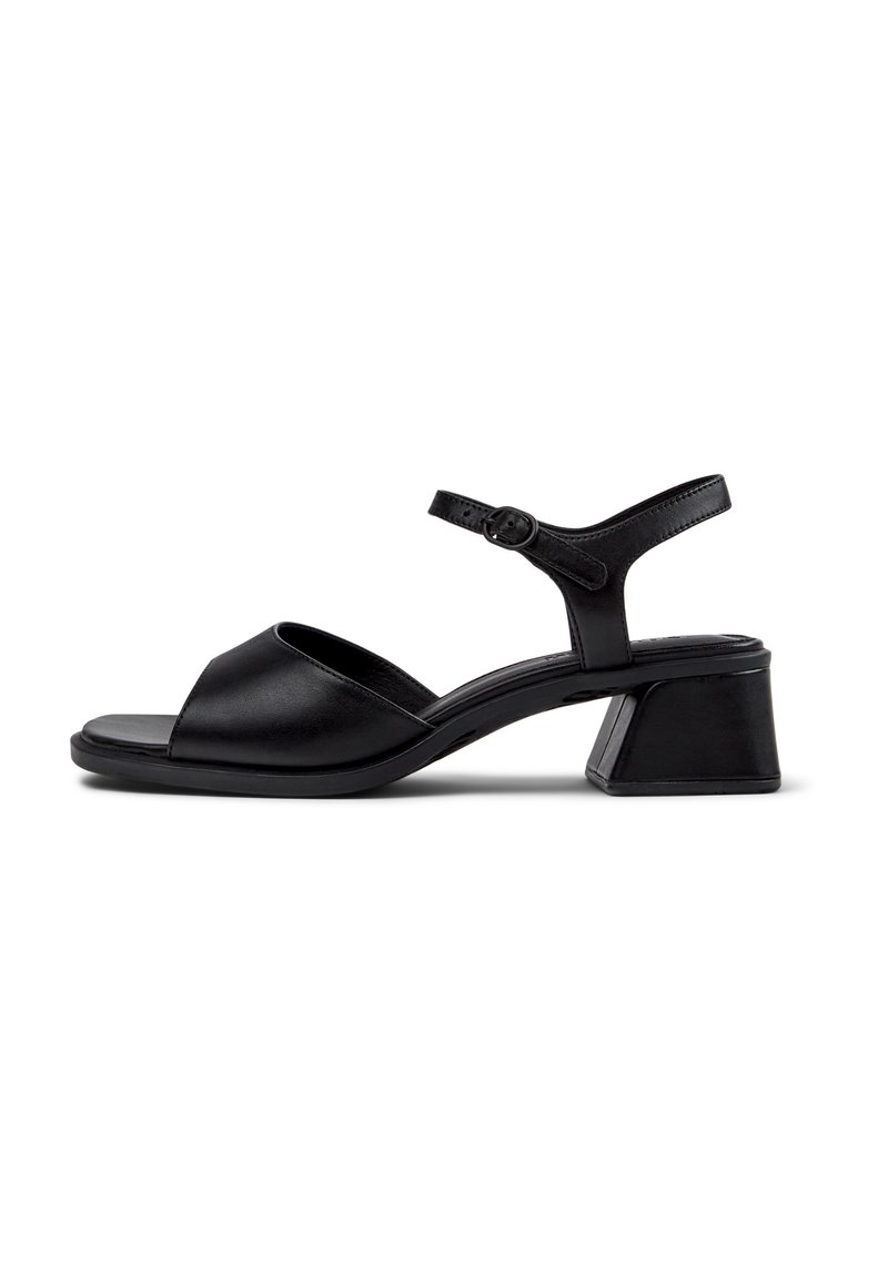 Black leather sandals with an open toe, ankle strap, and a block heel. The sole is flat and the design is minimalist.
