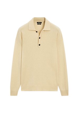 Pullover lavorato a maglia beige con colletto e tre bottoni neri. Presenta maniche lunghe e polsini e orlo a coste. Tessuto morbido.