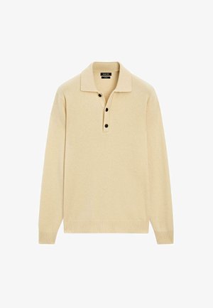 Pullover lavorato a maglia beige con colletto e tre bottoni neri. Presenta maniche lunghe e polsini e orlo a coste. Tessuto morbido.