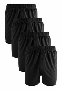Boxers en coton noir avec une taille élastique et une braguette à boutons. Quatre paires empilées, présentant une texture lisse et un design simple.