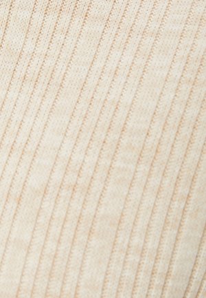 Beige gestrickter Stoff mit vertikaler Rippstruktur, weicher Oberfläche und subtiler Farbvariation. Das Material bietet ein glattes und elastisches Gefühl.