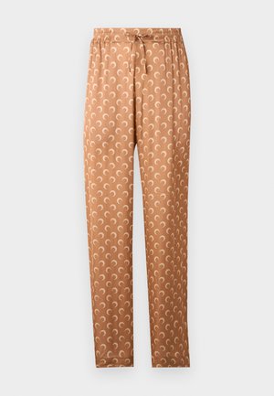 Rakstainās bikses siltā brūnā krāsā, kas iezīmējas ar atkārtojošos pusmēness dizainu gaišākā tonī. Elastīga josta ar aukliņu.