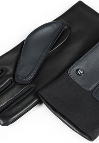 Gants en cuir noir avec un patch d'accent en bleu marine, tissu à texture douce et détail de bouton-pression pour une fermeture sécurisée.