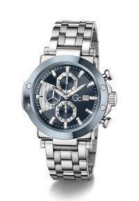 Silberne Metall-Armbanduhr mit dunkelblauem Zifferblatt, drei Hilfszifferblättern, Datumsanzeige bei 3 Uhr und einem Metallarmband mit Gliedern.