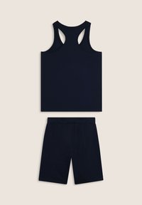 Set sportivo blu navy composto da una canotta senza maniche con schiena a corsetto e pantaloni corti abbinati con vita elastica. Tessuto morbido e liscio.