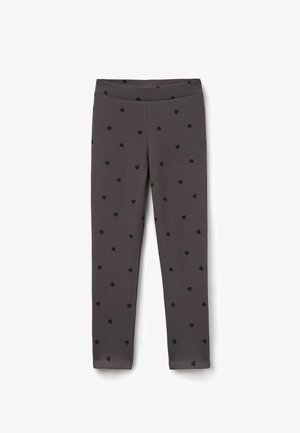 Šedé legíny vyrobené z měkké tkaniny, s vzorem malých černých srdcí rovnoměrně rozložených po povrchu. Design se strečovým pasem.