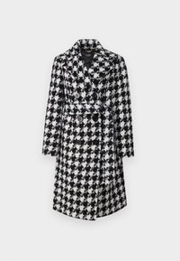 Divpusējs mētelis ar melnbaltu kaķa zobu rakstu, platām atloks un melnām pogām, izgatavots no teksturēta auduma.