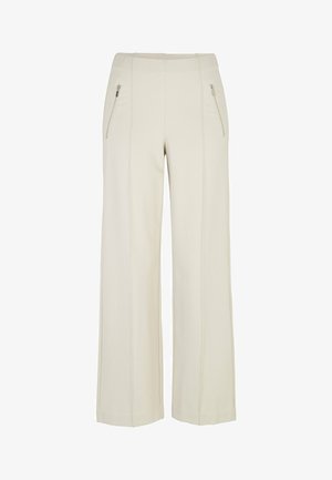 Wide-leg cream trousers with front vertical seams and silver zipper pockets on each side.