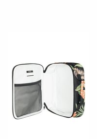 Tas met een zwarte stoffen buitenkant met een bloemenpatroon. De binnenkant is wit met een gaasvak aan de ene kant en een ruime compartiment.