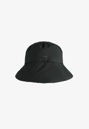 Cappello a secchiello nero con ampia tesa, realizzato in tessuto morbido e con il logo "OYSHO" discreto centrato nella parte anteriore.