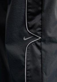 Nike Sportswear Treniņtērpa apakšdaļas - black