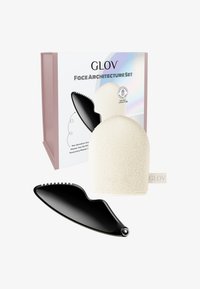 GLOV Face Architecture Set includes a white textured facial massager and a black gua sha tool with a smooth finish, presented in a pink box.