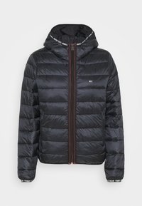 Black puffer jacket with a hood, vertical quilting, and dual zipper front. Features logo detailing on the collar and cuffs. Smooth, shiny material.