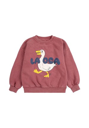 Sweatshirt rose à manches longues. Présente un graphique de canard blanc et le texte "LA OCA" en bleu. Texture douce, poignets et ourlet côtelés.