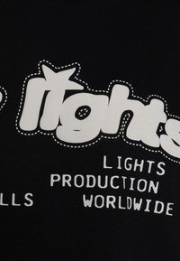 LOW LIGHTS STUDIOS® T-shirts print - black