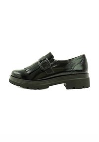 Zapato de cuero negro con un acabado brillante, que presenta una hebilla y un detalle de flecos. Tacón bajo con una suela texturizada. Vista lateral.