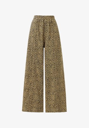 Pantalon large en tissu léger avec un fond beige et un motif léopard noir. Dispose d'une taille élastique pour un confort optimal.